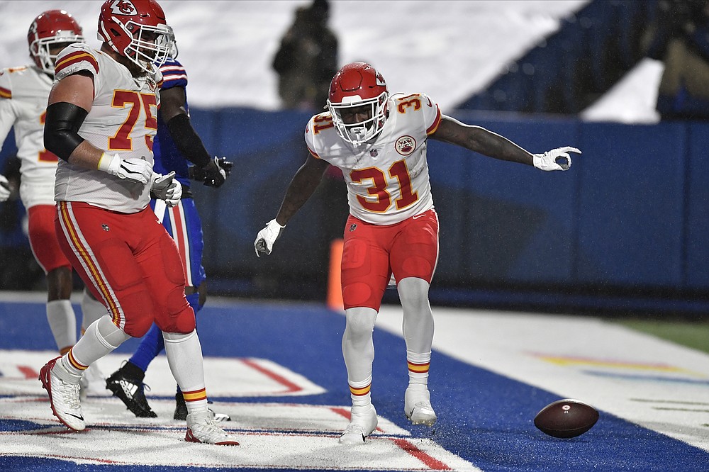 Chiefs kept on the ground, but run past Bills anyway