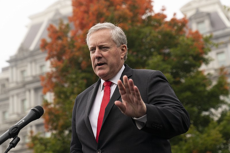 White House chief of staff Mark Meadows speaks with reporters at the White House, Wednesday, Oct. 21, 2020, in Washington. (AP Photo/Alex Brandon)