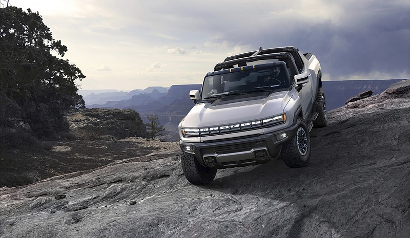 This photo provided by General Motors Co. shows the 2022 GMC Hummer EV. On Tuesday, Oct. 20, 2020, the company's GMC brand introduced the new electric Hummer pickup, with a high-end version due in showrooms sometime in the fall of 2021. (Courtesy of General Motors Co. via AP)