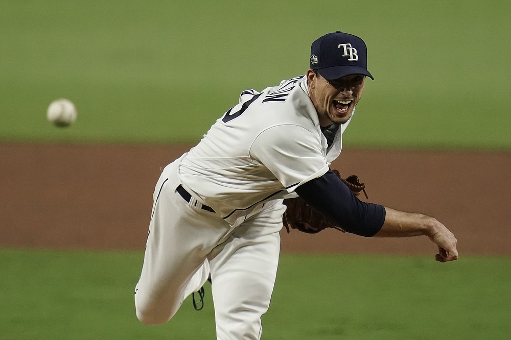 Tampa Bay Rays starting pitcher Charlie Morton throws against the Houston Astros during the sixth inning in Game 7 of a baseball American League Championship Series, Saturday, Oct. 17, 2020, in San Diego. (AP Photo/Gregory Bull)