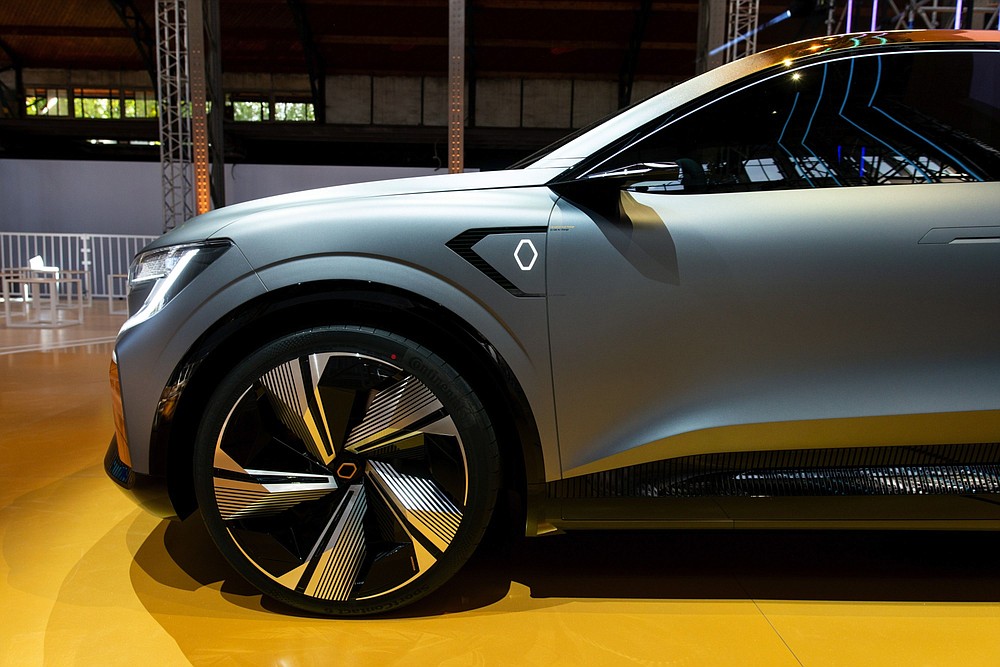 A Renault Megane eVision electric automobile, manufactured by Renault, is displayed during the automaker's E-Ways event in Paris, France, on Friday, Oct. 16, 2020. Renault's promotional blitz for its growing electric lineup may be too late for the maker of Europe's best-selling EV to stay atop the region's expanding market for battery-powered cars. MUST CREDIT: Bloomberg photo by Benjamin Girette