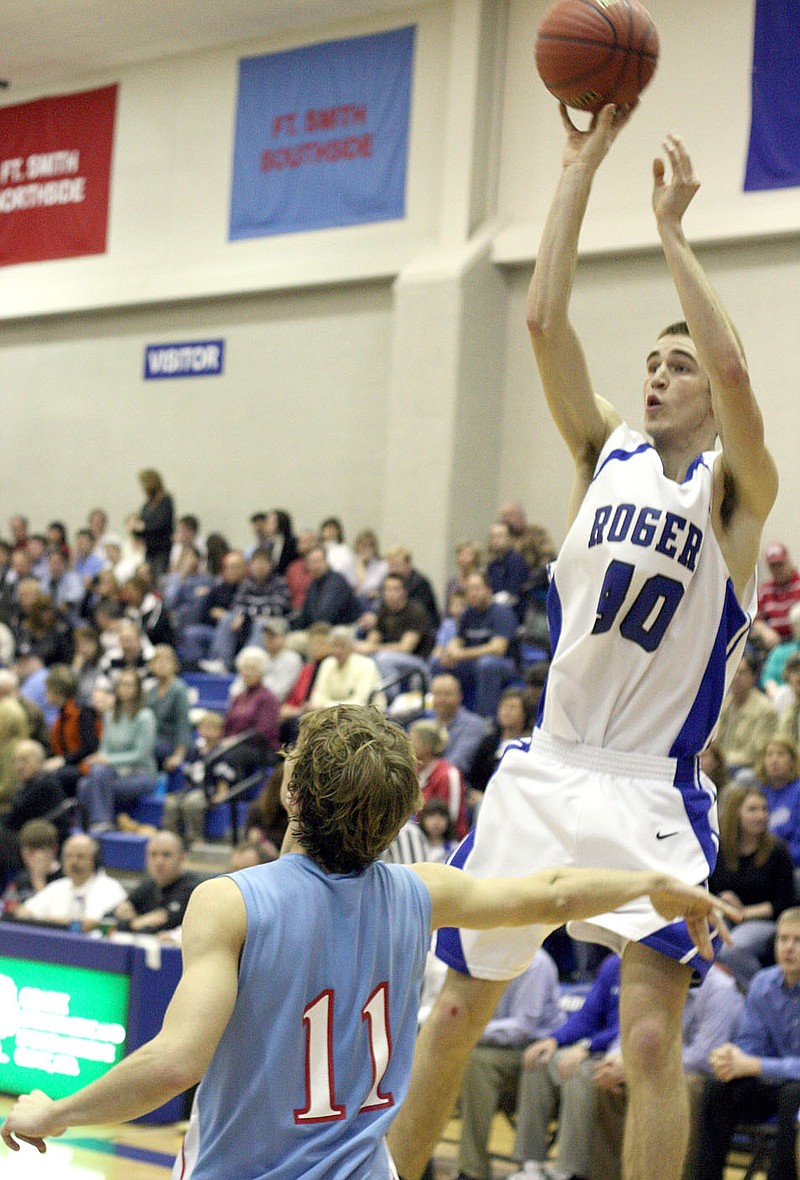 File photo
Former Rogers High basketball standout Aaron Hawley is one of five who are being inducted into the Rogers Athletic Hall of Fame this year. Hawley was an all-conference and all-state selection for the Mounties and went on to to play at Drake and later professionally in Germany and Hungary.

\