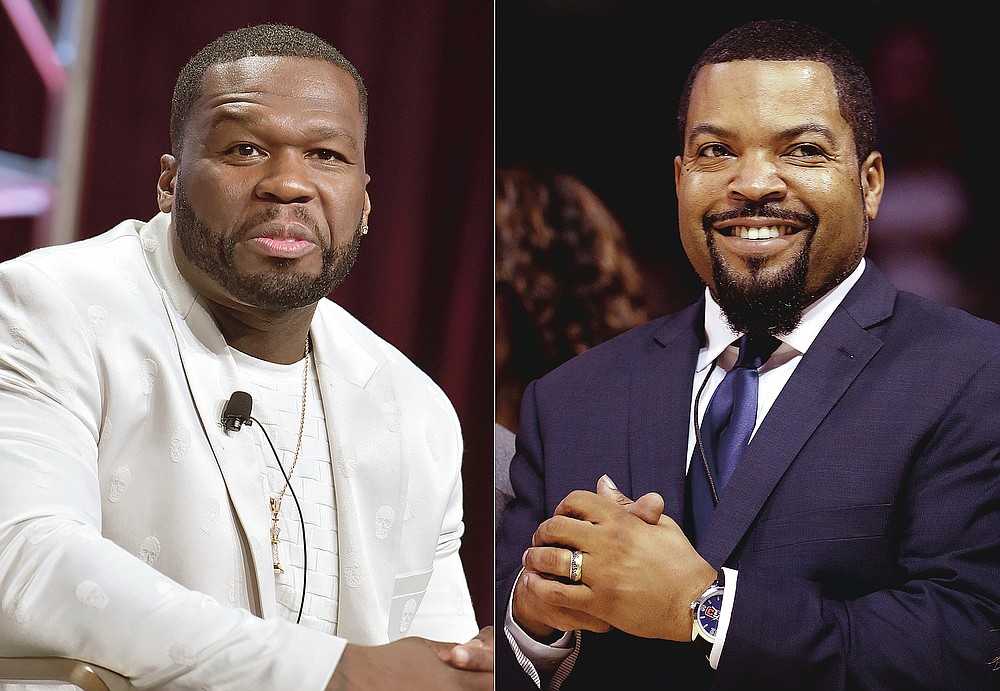 FILE - This combination of 2019 and 2017 photos shows Curtis "50 Cent" Jackson in Beverly Hills, Calif., left, and BIG3 League founder Ice Cube in New York. On Friday, Oct. 23, 2020, The Associated Press reported on a manipulated image circulating online incorrectly depicting them wearing hats that show support for President Donald Trump. The photo was altered to add a “Trump 2020” message to the hats. In the original photo, both rappers are wearing baseball caps with sports logos. (AP Photo)