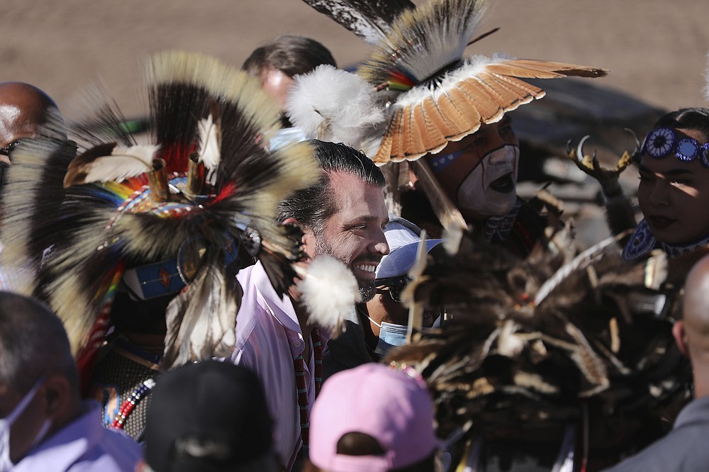 Donald Trump Jr. greets people who attended a rally Thursday, Oct. 15, 2020, in Williams, Arizona, that served as the launch of the Native Americans for Trump coalition. (Jake Bacon/Arizona Daily Sun via AP)