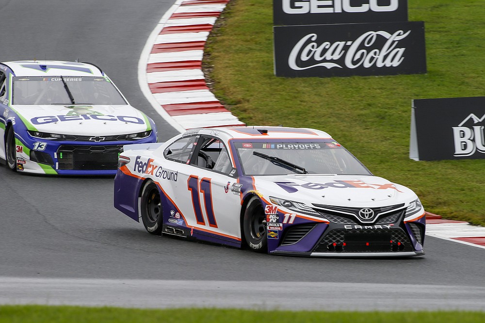 Denny Hamlin (11) competes in a NASCAR Cup Series auto race at Charlotte Motor Speedway in Concord, N.C., Sunday, Oct. 11, 2020. (AP Photo/Nell Redmond)