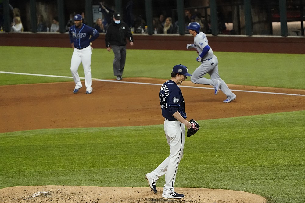 Los Angeles Dodgers pitcher Julio Urias celebrates the end of the top of  the eighth inning against the Tampa Bay Rays during in Game 6 of the  baseball World Series Tuesday, Oct.