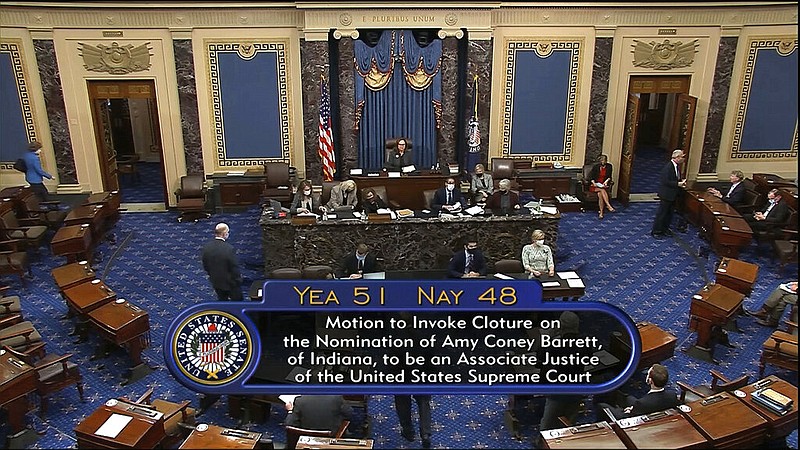 In this image from video, the vote total in the U.S. Senate to advance the nomination of Supreme Court nominee Amy Coney Barrett for a final confirmation vote at the U.S. Capitol in Washington, Sunday, Oct. 25, 2020. (Senate Television via AP)