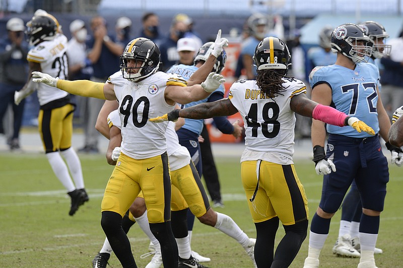 Pittsburgh Steelers outside linebackers T.J. Watt (90) and Bud Dupree (48) celebrate after a 45-yard field goal attempt by Tennessee Titans kicker Stephen Gostkowski was no good in the final seconds of the fourth quarter in an NFL football game Sunday, Oct. 25, 2020, in Nashville, Tenn. The Steelers won 27-24. (AP Photo/Mark Zaleski)