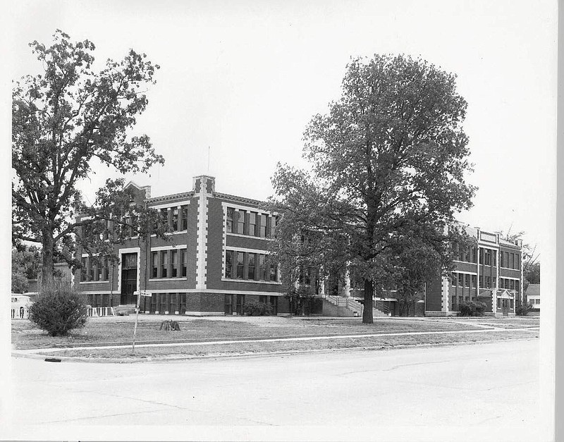 Rogers High School, c.1950, was led by superintendent Birch Kirksey. That year, the school system provided 17 buses for rural students and had just built a new football field and stadium on N. Eighth Street where the Post Office is now located. (photo courtesy of the Rogers Historical Museum)