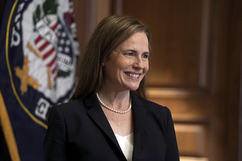 Supreme Court nominee Amy Coney Barrett, meets with Sen. Martha McSally, R-Ariz., Wednesday on Capitol Hill in Washington. - Greg Nash/Pool via AP