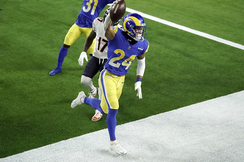 Los Angeles Rams safety Taylor Rapp (24) celebrates after intercepting a pass in the end zone during the second half of an NFL football game against the Chicago Bears Monday, Oct. 26, 2020, in Inglewood, Calif. (AP Photo/Ashley Landis)