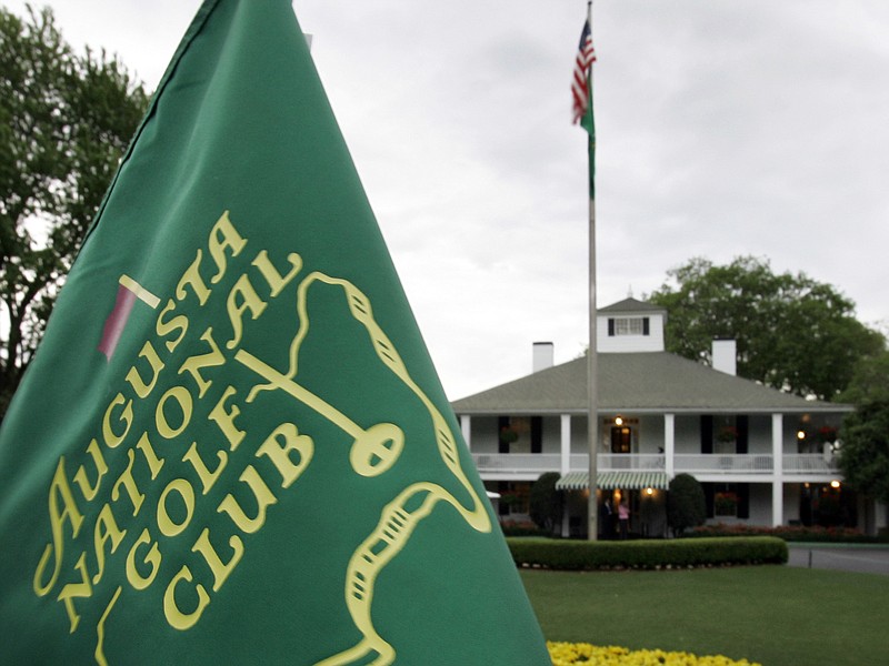 FILE - In this April 4, 2007, file photo, cloudy skies appear above the clubhouse at the Augusta National Golf Club in Augusta, Ga. The Par 3 Contest is out at the spectator-free Masters in November. ESPN's “College GameDay” is in. Augusta National announced Tuesday, Oct. 27, 2020, more changes to a Masters tournament that will be unlike any of the previous 83. The most unusual of all is ESPN's popular college football pregame show taking place on a stage that overlooks Ike's Pond and the ninth green of the Par 3 course. (AP Photo/David J. Phillip, File)