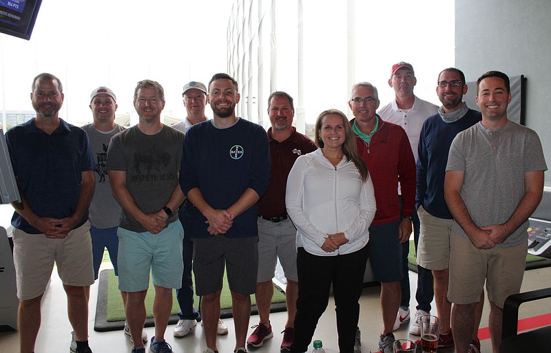 Brian Bealle (from left). Josh Lybbert, David Rieske, Doug Akin, Thomas Dewey, Brian Miller, Mary Cline, Tom McDonald, Brett Conduff and Peter Lee help represent Bayer at the Northwest Arkansas Children's Shelter fundraiser Oct. 18 at TopGolf in Rogers.
(NWA Democrat-Gazette/Carin Schoppmeyer) story.lead_photo.caption