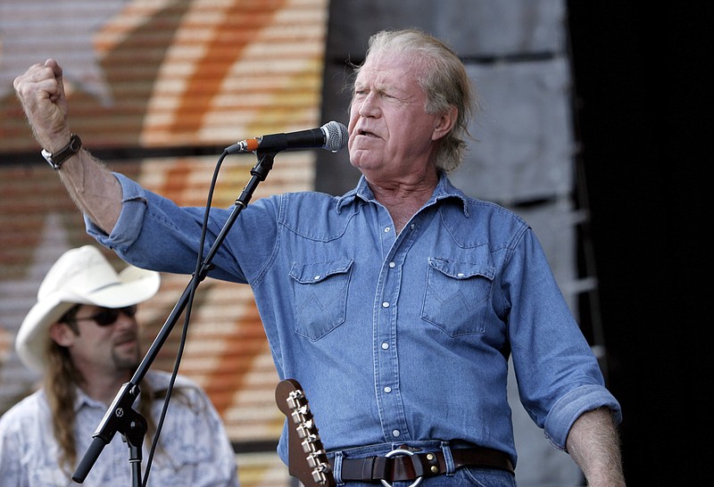 FILE - Singer Billy Joe Shaver performs at Farm Aid on Randall's Island in New York on Sept. 9, 2007. Shaver, who penned songs for Waylon Jennings, Willie Nelson and Bobby Bare, has died. His friend Connie Nelson said he died Wednesday in Texas following a stroke. He was 81. (AP Photo/Jason DeCrow, File)