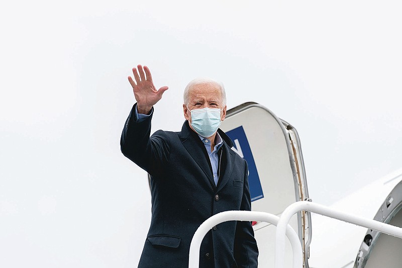 FILE - In this Friday, Oct. 30, 2020, file photo, Democratic presidential candidate former Vice President Joe Biden boards his campaign plane at New Castle Airport in New Castle, Del., to travel to Des Moines, Iowa, for scheduled rallies in Des Moines, St. Paul, Minnesota, and Milwaukee, Wisconsin. (AP Photo/Andrew Harnik) story.lead_photo.caption