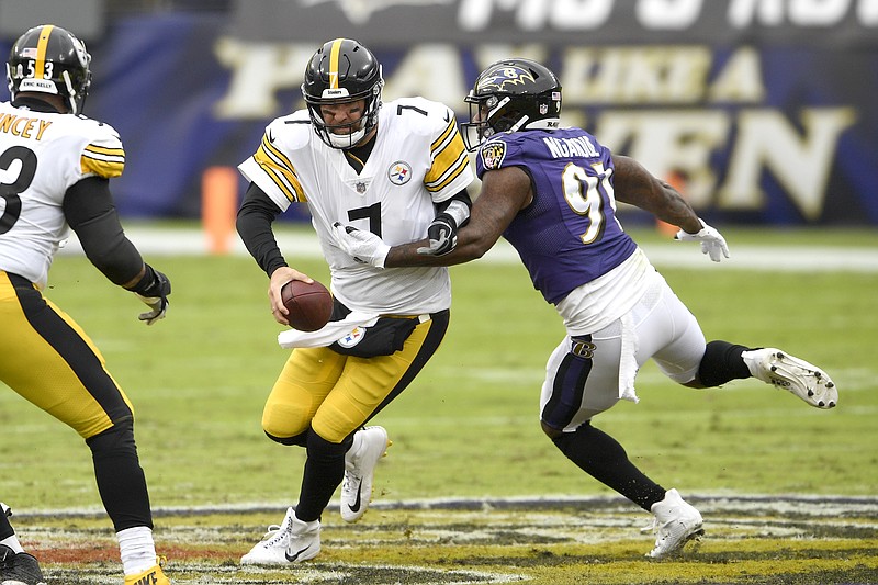 Baltimore Ravens defensive end Yannick Ngakoue (91) applies pressure on Pittsburgh Steelers quarterback Ben Roethlisberger (7) during the first half of an NFL football game, Sunday, Nov. 1, 2020, in Baltimore. (AP Photo/Nick Wass)