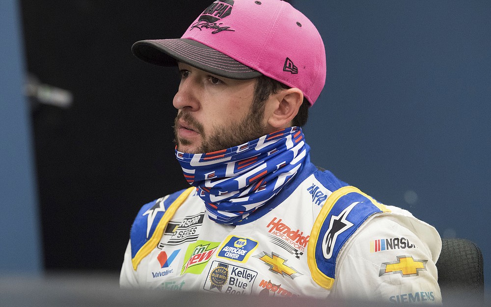Chase Elliott (9) sits in the media room after winning a NASCAR Cup Series auto race at the Martinsville Speedway in Martinsville, Va., Sunday, Nov.1, 2020. (AP Photo/Lee Luther Jr.)