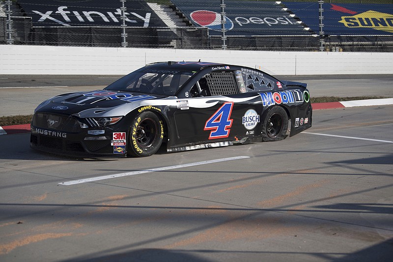 Kevin Harvick (4) heads into the pit area during a NASCAR Cup Series auto race at the Martinsville Speedway in Martinsville, Va., Sunday, Nov. 1, 2020. (AP Photo/Lee Luther Jr.)