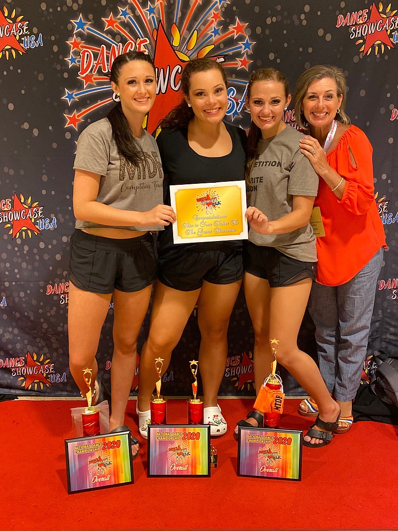 From left, dancers Isabella Soto, Kennedy Canada and Cassidy Jones, along with Tana Soto Cook, Mrs. Tana’s Dance Factory owner, show awards after winning third place in the Senior Competition Duos/Trios at the Dance Showcase USA talent competition at Dallas, Texas. (Special to The Commercial)