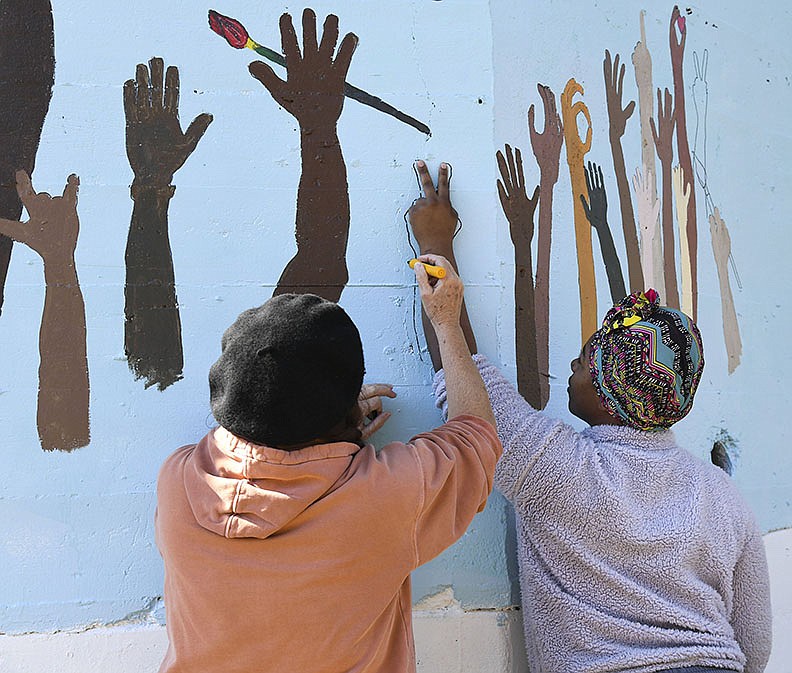 Cultural mural being painted at Jonestown Hot Springs Sentinel Record