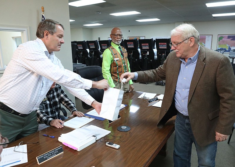 State Rep. Richard McGrew, right, draws for a ballot position at the Garland County Election Commission building on Nov. 15, 2019. - File photo by Richard Rasmussen of The Sentinel-Record