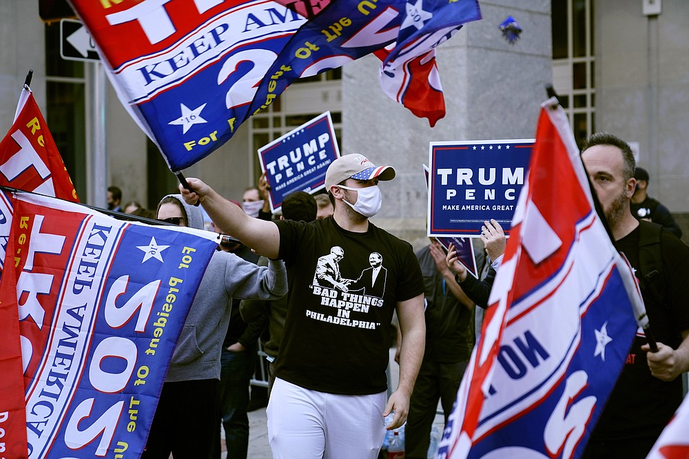 Supporter of President Donald Trump demonstrate outside the Pennsylvania Convention Center where votes are being counted, Thursday, Nov. 5, 2020, in Philadelphia, following Tuesday's election. (AP Photo/Matt Slocum)