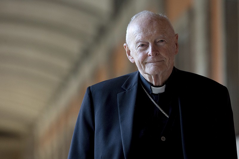 FILE - In this Feb. 13, 2013 file photo, Cardinal Theodore Edgar McCarrick poses for a photo in Rome. The Vatican on Tuesday will release its long-awaited report into what it knew about ex-Cardinal Theodore McCarrick’s sexual misconduct during his rise through the church hierarchy. The Vatican said Friday, Nov. 6, 2020 the report would span McCarrick’s entire life, from his birth in 1930 to the 2017 allegations that brought about his downfall. The Vatican said the report would cover “the Holy See’s institutional knowledge and decision-making process” as he rose through the church's ranks. (AP Photo/Andrew Medichini, File)