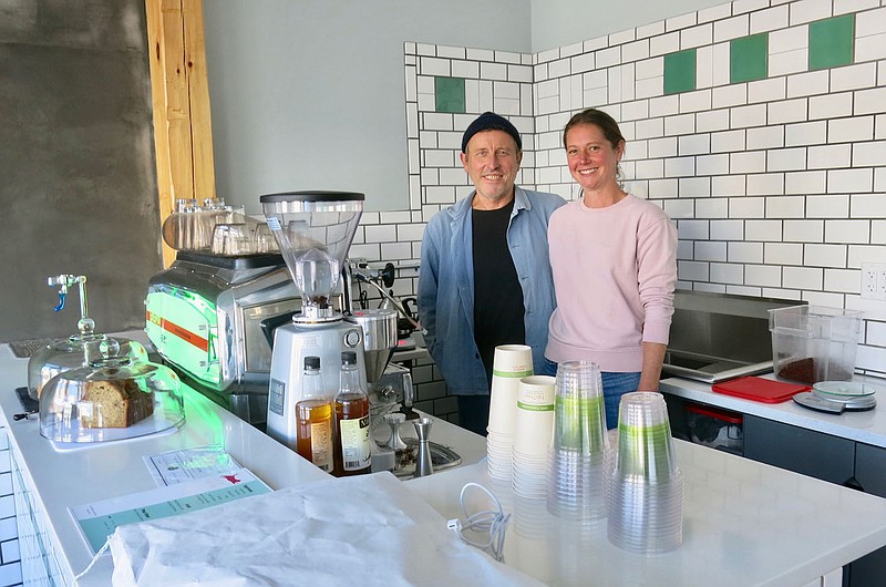 Westside Eagle Observer/SUSAN HOLLAND
Steven Kann and Emily Gilliom pause behind the counter at their newly opened Flyer Coffee shop at 123 Main Street S.E. in Gravette. The shop, which offers several flavors of espresso, as well as mocha, hot chocolate and baked goods, is open 9 a.m. to 6 p.m. Tuesday through Friday, 10 a.m. to 4 p.m. on Saturday and 10 a..m to 4 p.m. on Sunday.