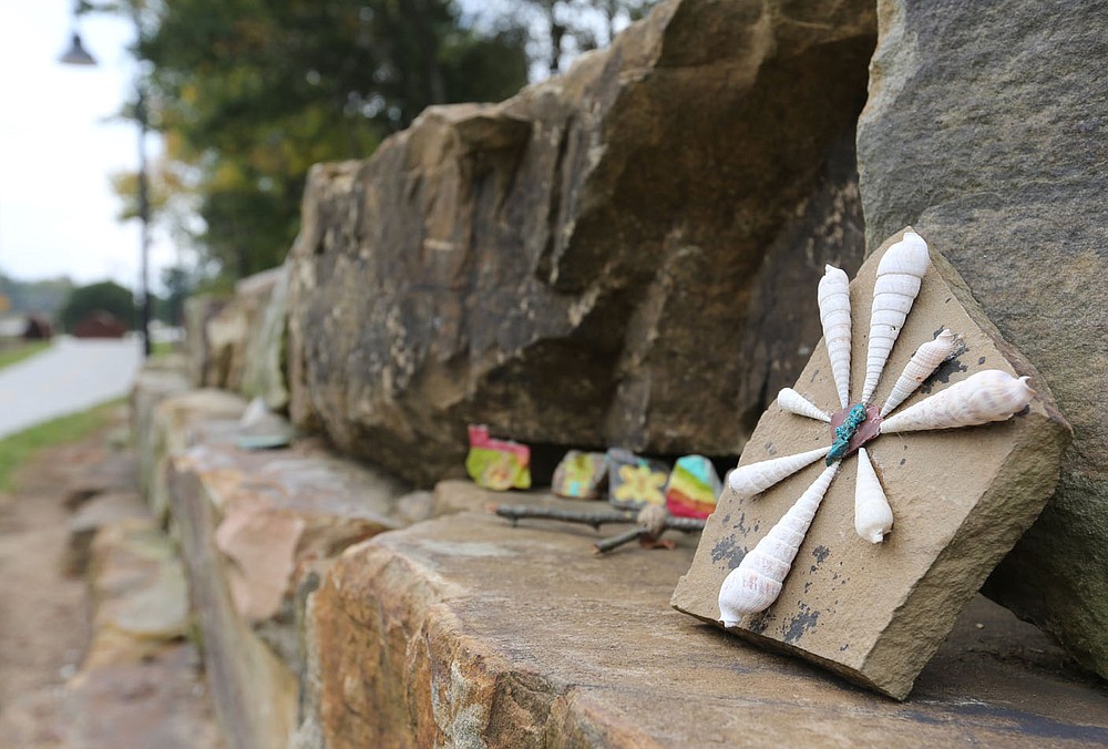 Decorated rocks are visible Thursday, October 8, 2020, on a new section of trail just south of Sweetbriar Park in Fayetteville. A number of projects related to parks and trails in the city are continuing despite operational budget cuts because of the covid-19 pandemic. Niokaska Creek Trail was unveiled to the public Monday, and stretches from Gulley Park to Sweetbriar Park and connects to Mud Creek Trail to the north. Check out nwaonline.com/201011Daily/ and nwadg.com/photos for a photo gallery.(NWA Democrat-Gazette/David Gottschalk)