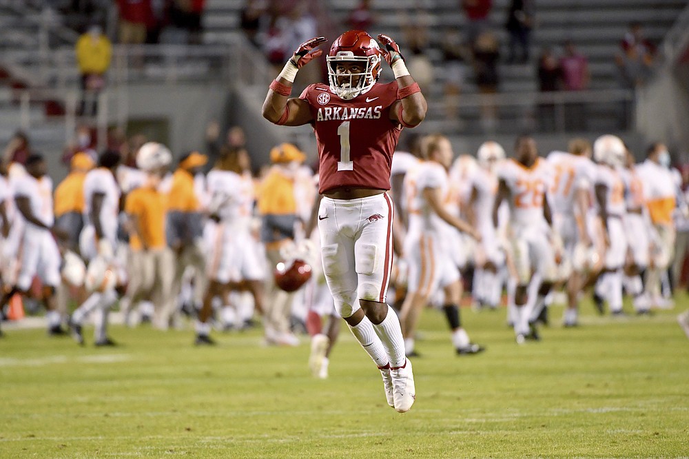 Arkansas defensive back Jalen Catalon (1) celebrates after Arkansas defeated Tennessee 24-13 in an NCAA college football game Saturday, Nov. 7, 2020, in Fayetteville, Ark. (AP Photo/Michael Woods)