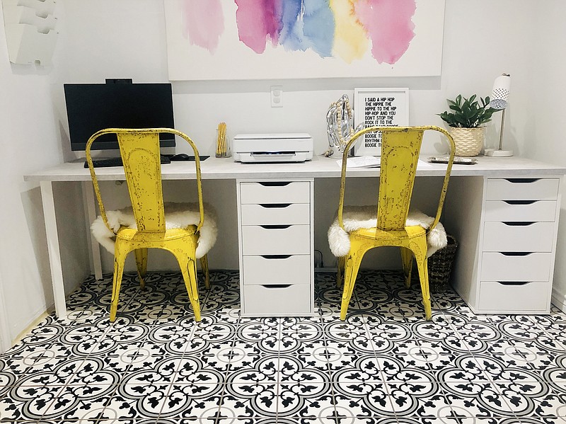 Jen McDonald chose an ornate black, white and gray cement square tile for her laundry room, which now acts as an office, classroom and craft room. (The Washington Post/Jen McDonald)