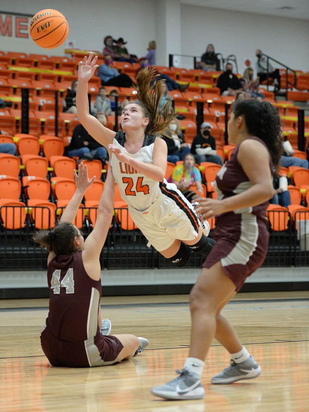 Andy Shupe/NWA Democrat-Gazette
Gravette's Reese Hamilton (24) leaps Tuesday to score over Siloam Springs' Mia Hevener (44) during the first half of play in Gravette.