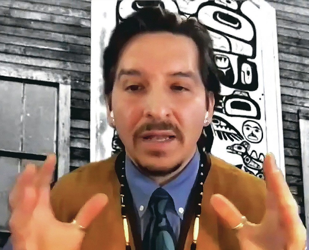 This Nov. 5, 2020, image provided by the Sealaska Heritage Institute shows moderator David Sheakley-Early during a Zoom memorial service for Tlingit elder David Katzeek, honoring Katzeek over the internet as the pandemic had made in-person ceremonies impossible. (Sealaska Heritage Institute via AP)