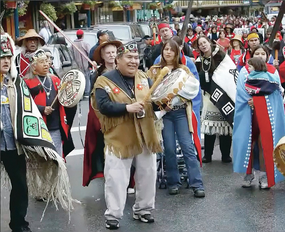 This Nov. 5, 2020, photo provided by the Sealaska Heritage Institute shows a Zoom memorial service for Tlingit elder David Katzeek, conducted by the Institute, showing highlights of Katzeek's life as people honored him over the internet as the pandemic had made in-person ceremonies impossible.  (Sealaska Heritage Institute via AP)