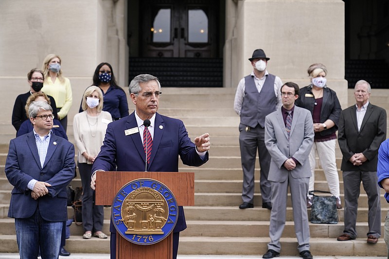 Georgia Secretary of State Brad Raffensperger speaks during a news conference on Wednesday, Nov. 11, 2020, in Atlanta. Georgia election officials have announced an audit of presidential election results that will trigger a full hand recount. (AP Photo/Brynn Anderson)