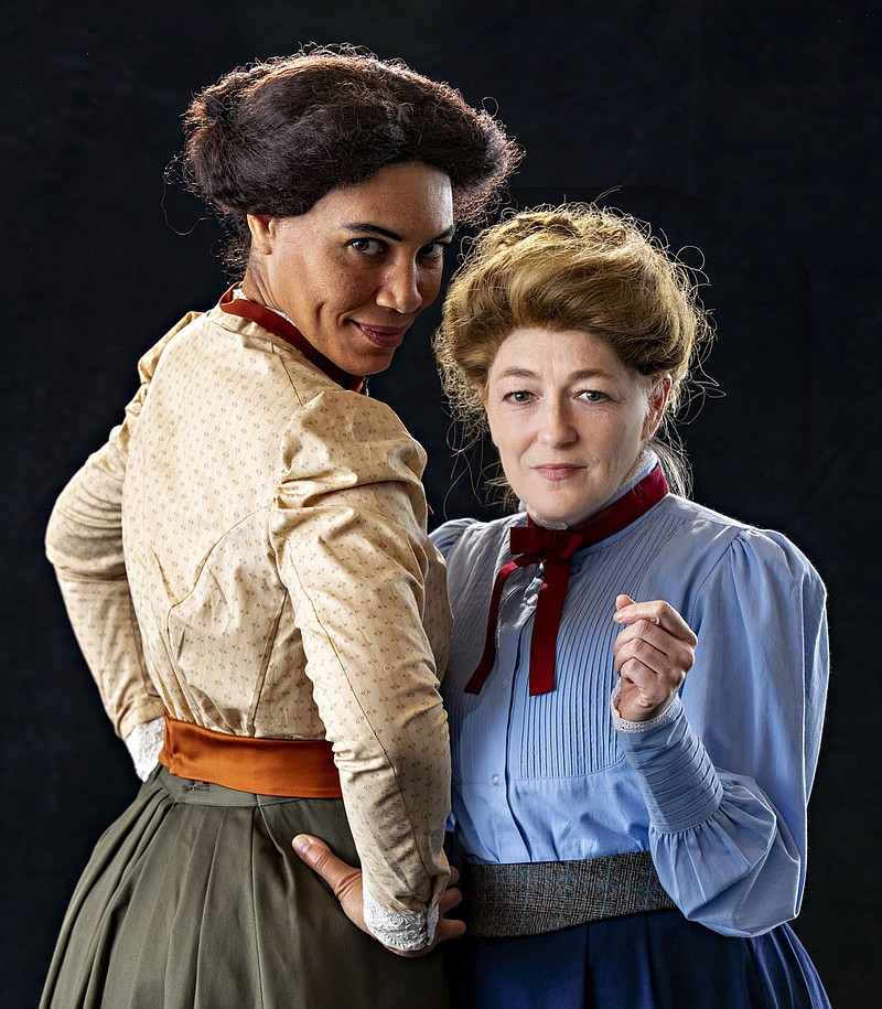 “I think [playwright Lauren Gunderson] is very bold in the way she uses language,” says actor Rebecca Harris (right) playing Marie Curie with Leontyne Mbele-Mbong as Hertha Ayrton in the TheatreSquared production of “The Half-Life of Marie Curie.” “She allows the characters to be candid and passionate. Curie and Ayrton were real women, living with real impulses and adversity as well as joy and achievement. Gunderson allows for all of that.” The docu-drama opens Nov. 28 online via theatre2.org. Tickets are $20. (Courtesy Photo/Wesley Hitt via T2)