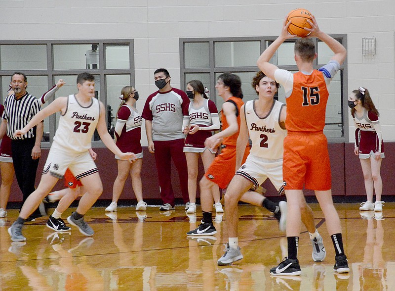 Graham Thomas/Siloam Sunday
Siloam Springs senior Max Perkins, No. 2, guards Gravette's Tristan Batie, No. 15 during a benefit game on Tuesday at Panther Activity Center. Siloam Springs defeated Gravette 72-48.