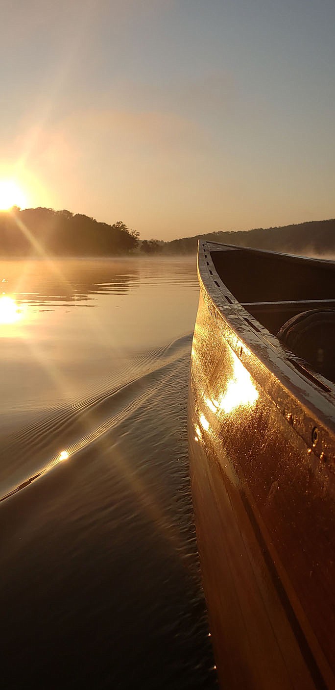 Sunrise lights up the bow of Eliasen's sleek canoe.
(Courtesy photo/Tony Eliasen)