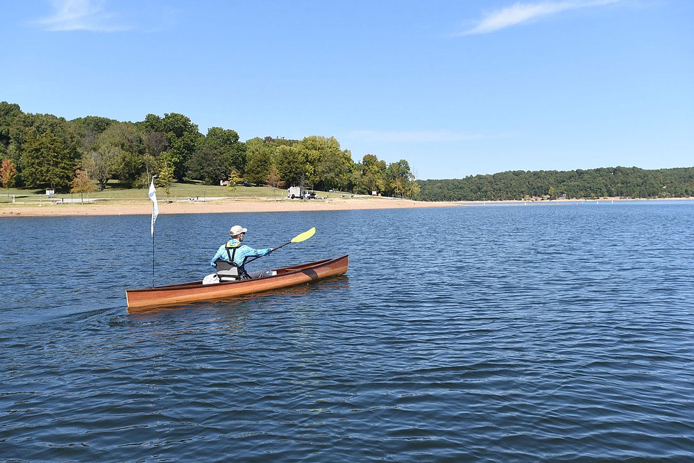 Eliasen makes his way past Horseshoe Bend park on Oct. 2 2020 at Beaver Lake.
(NWA Democrat-Gazette/Flip Putthoff)
