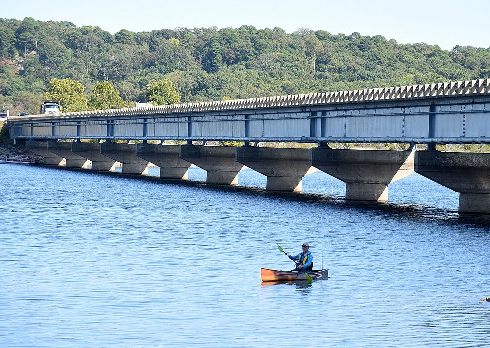 Eliasen wraps up the first day of his trip, taking out at the Arkansas 12 bridge after paddling 20 miles from the U.S. 412 bridge.
(NWA Democrat-Gazette/Flip Putthoff)