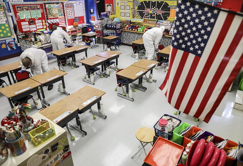 Schools abandon in-person classes, states retreat amid virus resurgence