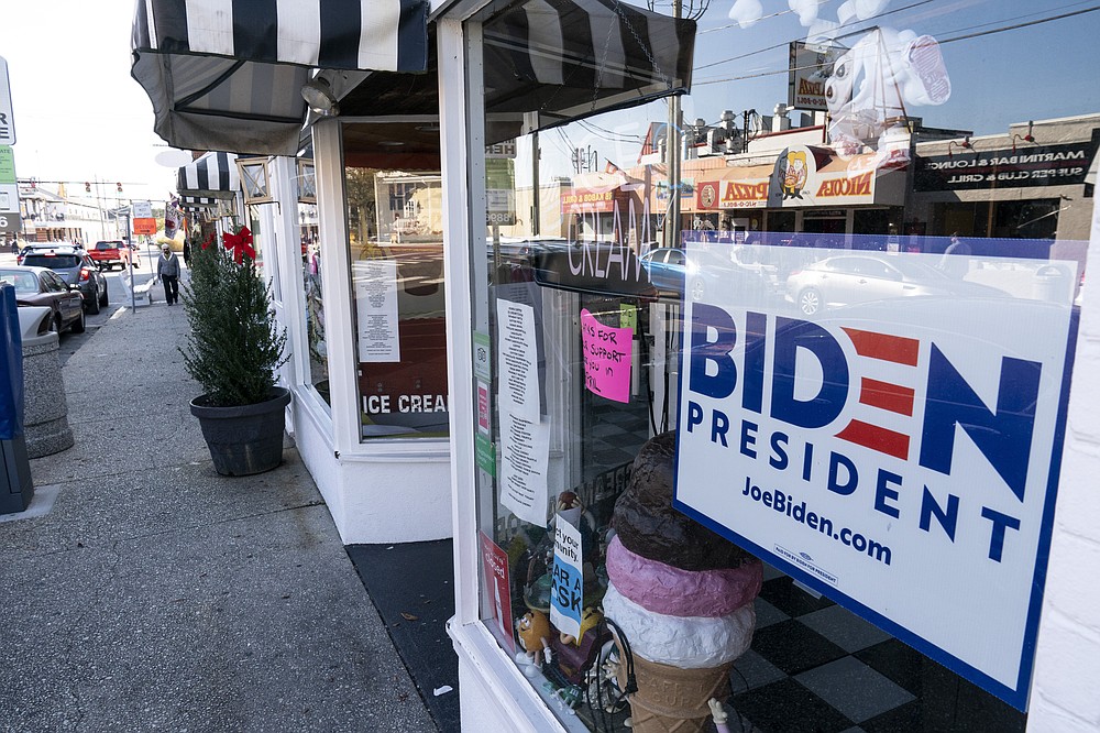 A sign for President-elect Joe Biden is displayed in a shop window, Friday, Nov. 13, 2020, in Rehoboth Beach, Del. This resort town known for Atlantic waves that are sometimes surfable, fresh-cut French fries and a 1-mile wooden boardwalk that dates back to the 1870s has long prided itself on being the “Nation's Summer Capital.”
It may soon sport a beach White House. (AP Photo/Alex Brandon)