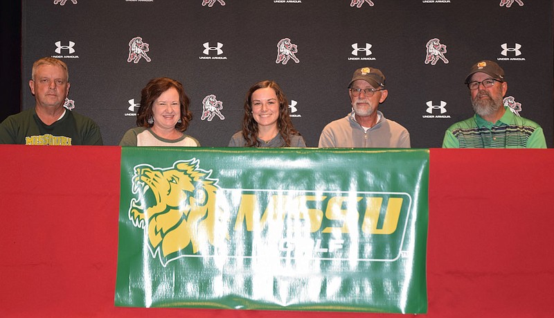 RICK PECK/SPECIAL TO MCDONALD COUNTY PRESS McDonald County's Lily Allman recently signed a letter of intent to play golf at Missouri Southern State University in Joplin.From left to right are Darryl Harbaugh (MCHS golf coach), Julie Allman (mom), Lily Allman, Mark Allman (dad) and Kirk Allman (uncle).
