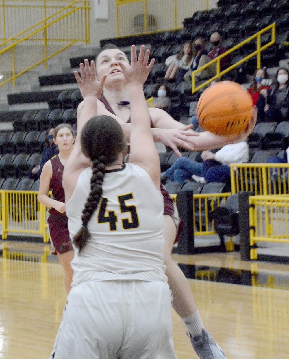 Graham Thomas/Herald-Leader
Siloam Springs junior Reina Tiefel drives to the basket as Prairie Grove's Zoe Hobbs defends during Monday's game in Prairie Grove. The Lady Panthers defeated the Lady Tigers 47-35.