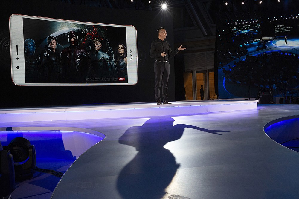 George Zhao, Huawei's Honor brand president speaks during an event to launch one of its mobile phone in Beijing, China, Tuesday, May 10, 2016. In an announcement Tuesday, Nov. 17, 2020, Chinese tech giant Huawei says it is selling its budget-price Honor smartphone brand in an effort to rescue the struggling business from damaging U.S. sanctions imposed on its parent company. (AP Photo/Ng Han Guan)