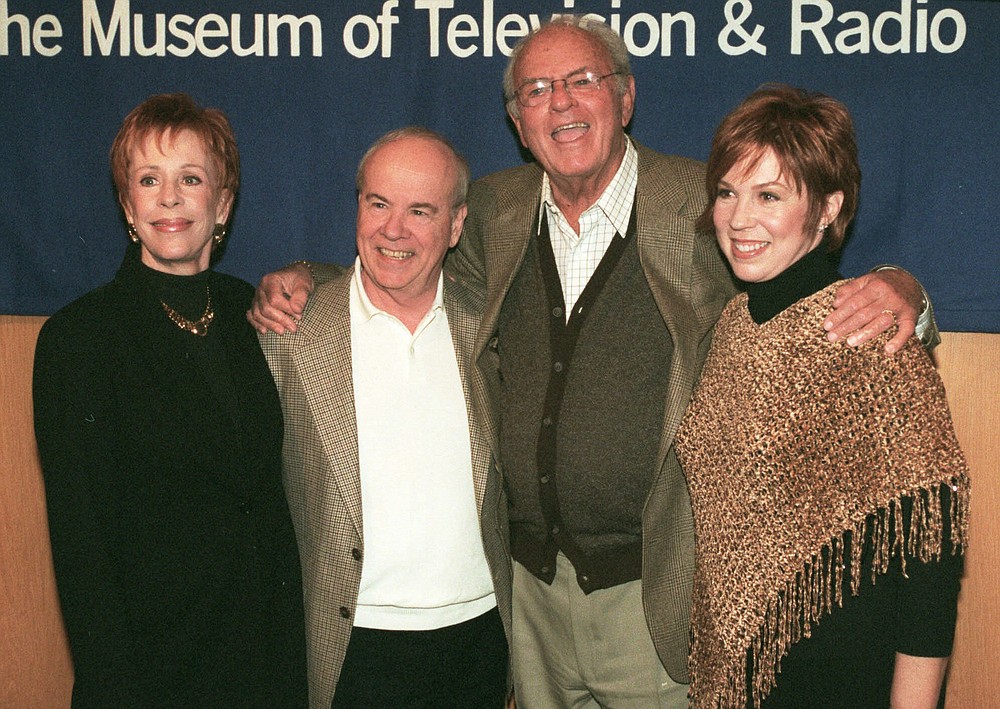 REMOVES REFERENCE TO HULU - FILE - Cast members of "The Carol Burnett Show", from left, Carol Burnett, Tim Conway, Harvey Korman and Vicki Lawrence pose for a photo before attending a discussion of the former television show at the Director's Guild Theater in the Hollywood section of Los Angeles, on March 3, 2000. Episodes of "The Carol Burnett Show" are available on streaming services like Tubi and The Roku Channel. (AP Photo/Neil Jacobs, File)