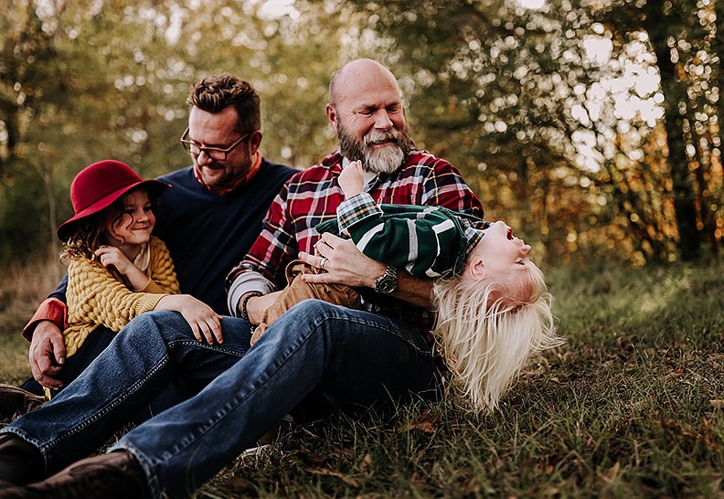 Stephen Inman-Crawley, left, and Eddie Inman-Crawley with their children Rhetta, left, and Rhys. Photo courtesy of Kara Holiman of Wild Light Creative. - Submitted photo