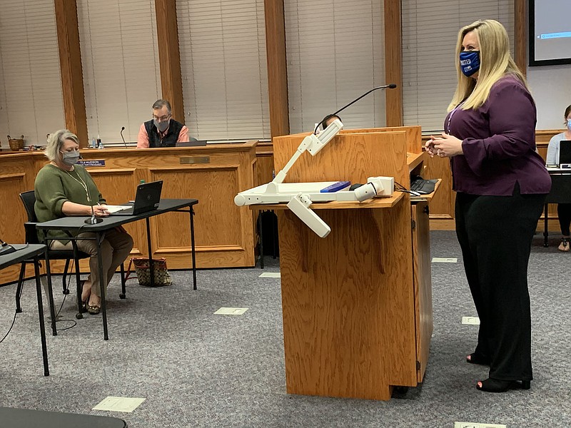 Megan Duncan, Support Services associate superintendent, shares details about the district's ventilation system projects Thursday at a meeting of the Fayetteville School Board. (NWA Democrat-Gazette/Mary Jordan)