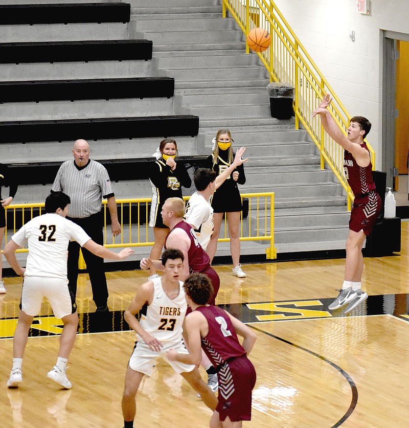MARK HUMPHREY ENTERPRISE-LEADER/Siloam Springs junior Josh Stewart scored the first three points of the game at Prairie Grove on an in-bounds play. The Panthers made 11 3-pointers in a 79-27 win Thursday. story.lead_photo.caption