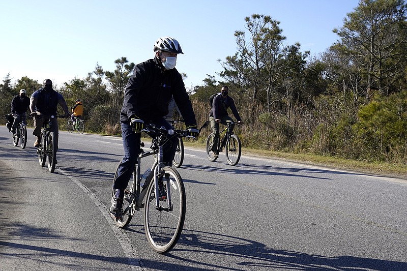FILE - In this Nov. 14, 2020, file photo President-elect Joe Biden rides a bike at Cape Henlopen State Park in Lewes, Del. President-elect Biden turns 78 on Friday, Nov. 20. (AP Photo/Alex Brandon, File) story.lead_photo.caption